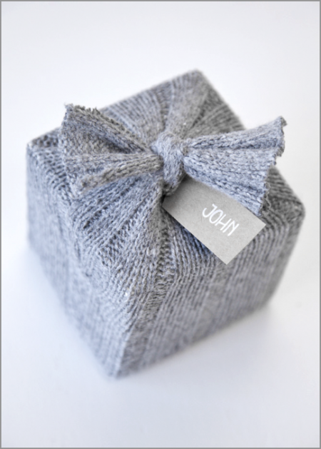 Sweater gift wrap tied with a bow