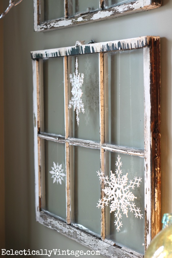 Vintage window with snowflakes - see the wintry white dining room at kellyelko.com