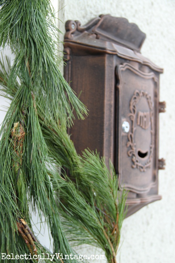 Christmas porch - love the fresh garland kellyelko.com