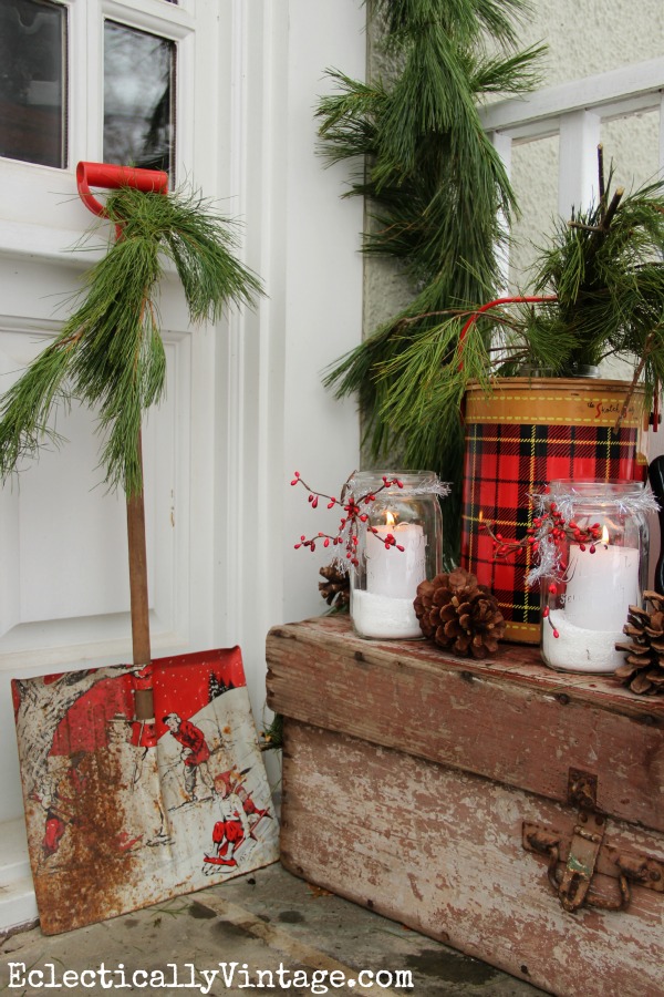 What a fun winter porch - love that cute vintage shovel kellyelko.com