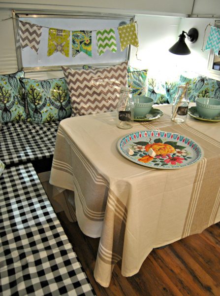 Oilcloth pillows and buntings - such a fun retro look!