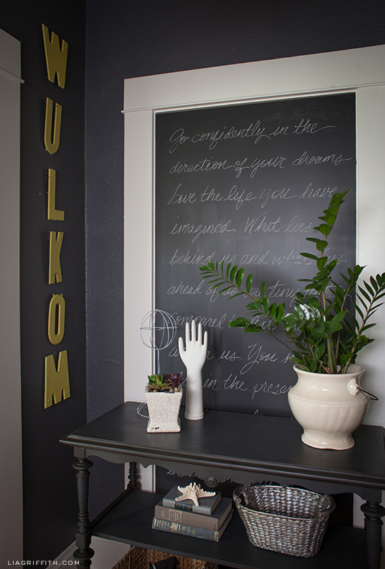 Love this chalkboard entry wall