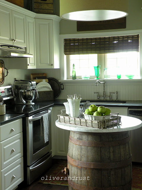 LOVE this fun wine barrel kitchen island!