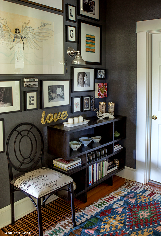 Gallery Wall - love the sentimental objects and dramatic wall color