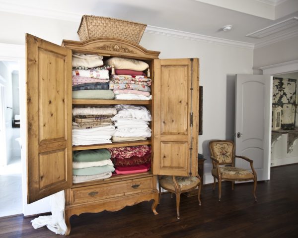 Armoire turned linen closet