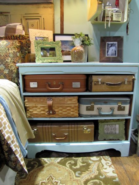 Dresser with vintage suitcase storage