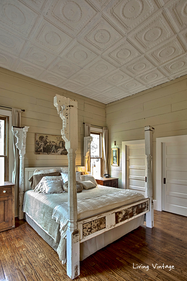 They made this bed from old porch columns and doors!