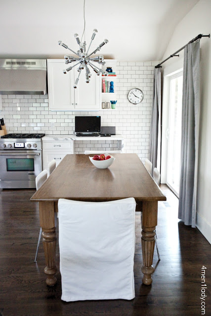 Love the subway wall of tile in this gorgeous kitchen