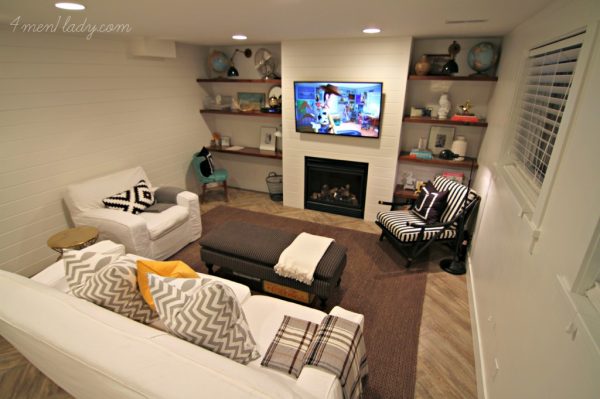 Beautiful basement renovation - love the shelves and plank wall