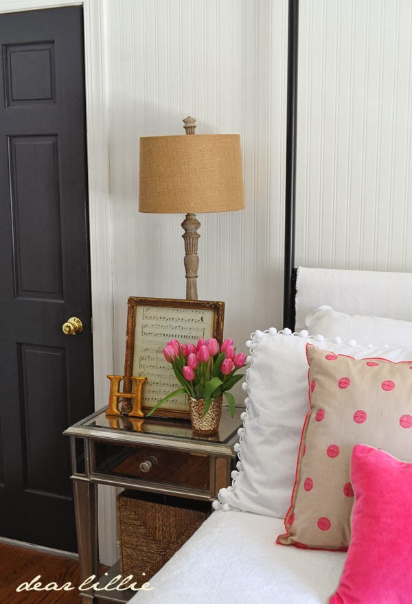 Pretty bedside table - and love the black door