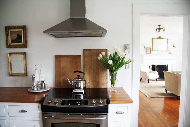 Lovely farmhouse kitchen - love the breadboards kellyelko.com