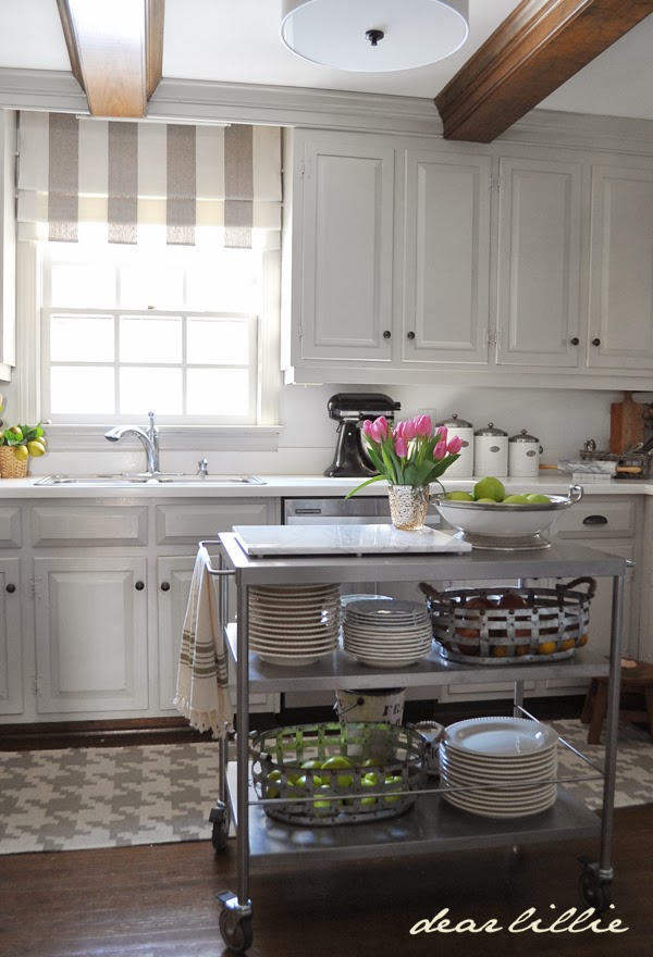 Love the stainless steel kitchen island in this home tour