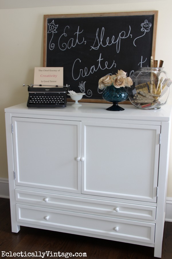 Love this light and bright craft room - so much storage! kellyelko.com