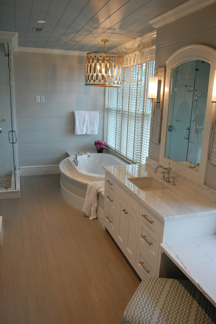 Tranquil master bathroom - love the blue plank ceiling kellyelko.com