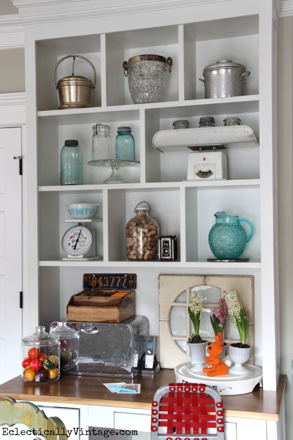 Styling open shelves - love these fun collections! kellyelko.com