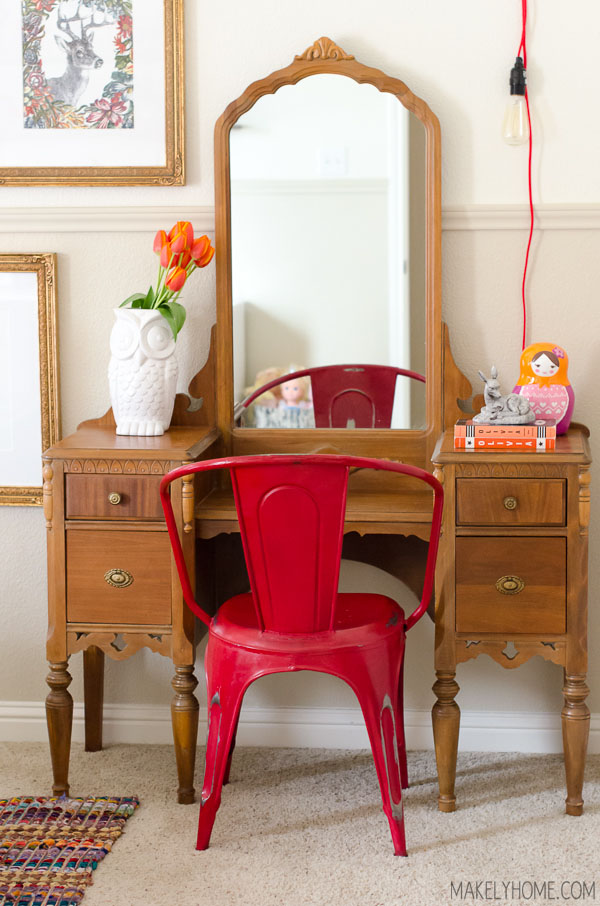 Love the mix of the antique vanity with the modern chair kellyelko.com