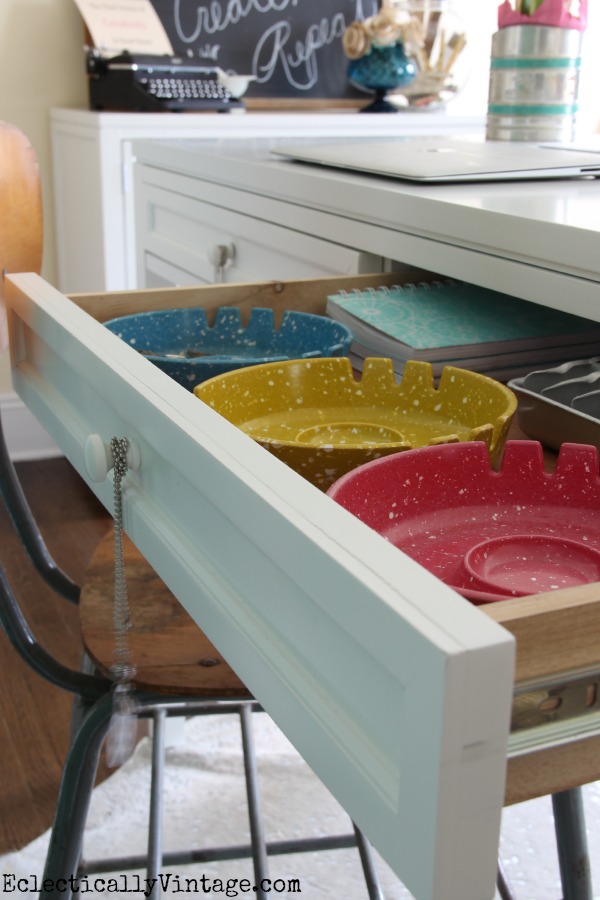 Love the vintage ashtray drawer organizers in this bright craft room! kellyelko.com