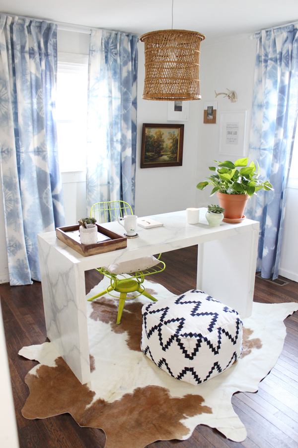 Chic home office with a DIY desk and curtains kellyelko.com