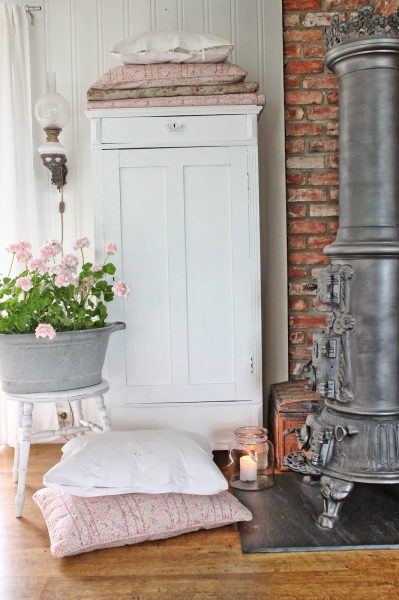 Love this exposed brick wall in this cottage tour kellyelko.com