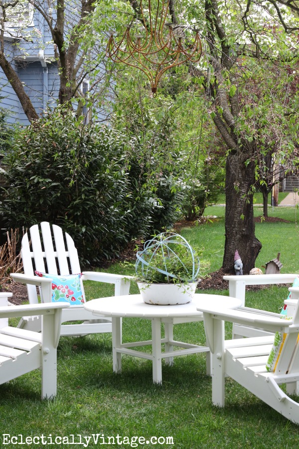 Love this adirondack chair set - and the chandelier hanging from the tree! kellyelko.com