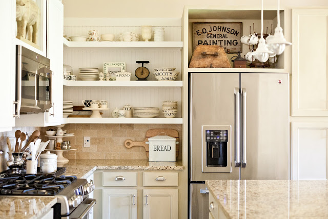 Little Cottage on the Pond home tour - love the open kitchen shelves kellyelko.com