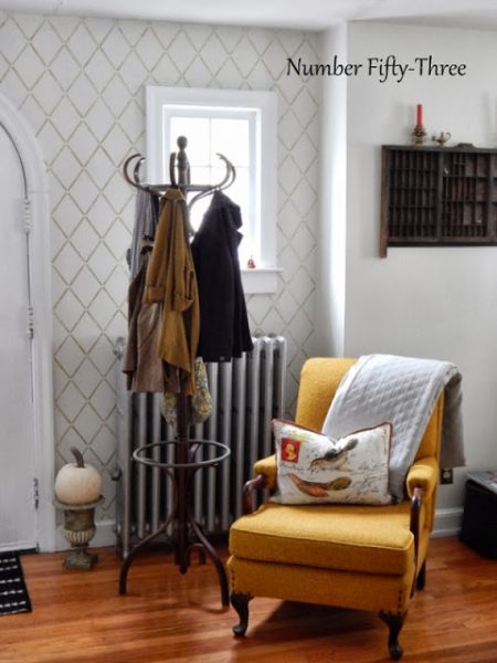 Beautiful vintage filled home - love the stenciled wall kellyelko.com