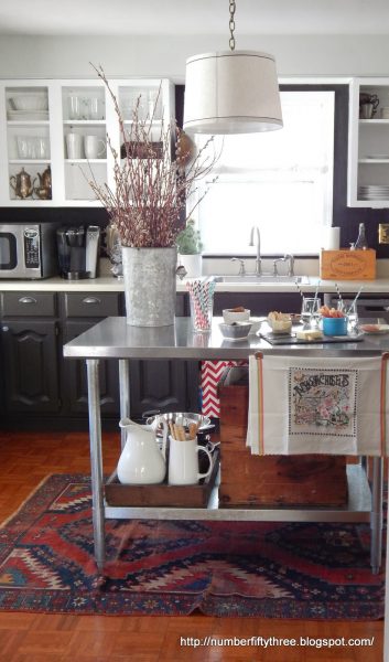 Gorgeous kitchen - love the mismatched cabinets, open shelving and stainless island kellyelko.com