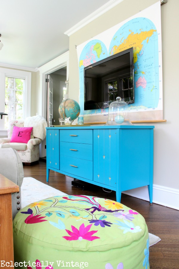 Colorful Sunroom - love the map behind the tv!  kellyelko.com