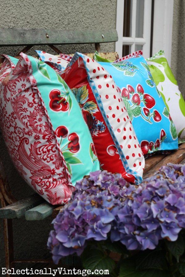 Oilcloth pillows - perfect for outdoors! LOVE the fun prints! kellyelko.com