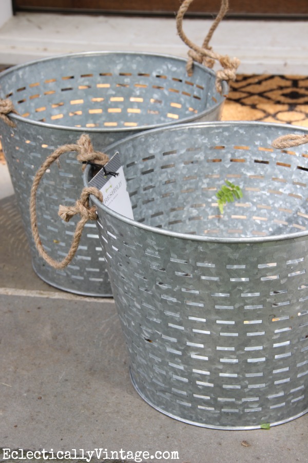 Knock off olive buckets - she used them as hanging planters and they look amazing! kellyelko.com