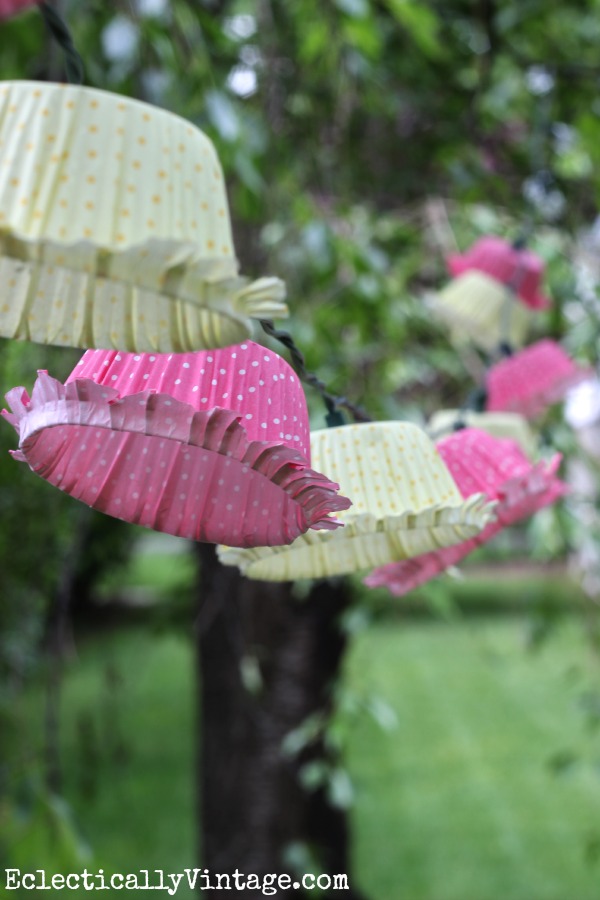 Make cupcake liner string lights - these look amazing strung from the trees! kellyelko.com