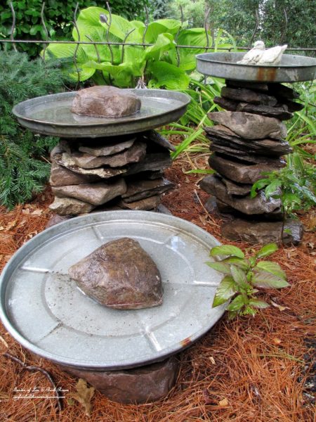 Such cute stone birdbaths! One of the creative ideas in this garden tour kellyelko.com