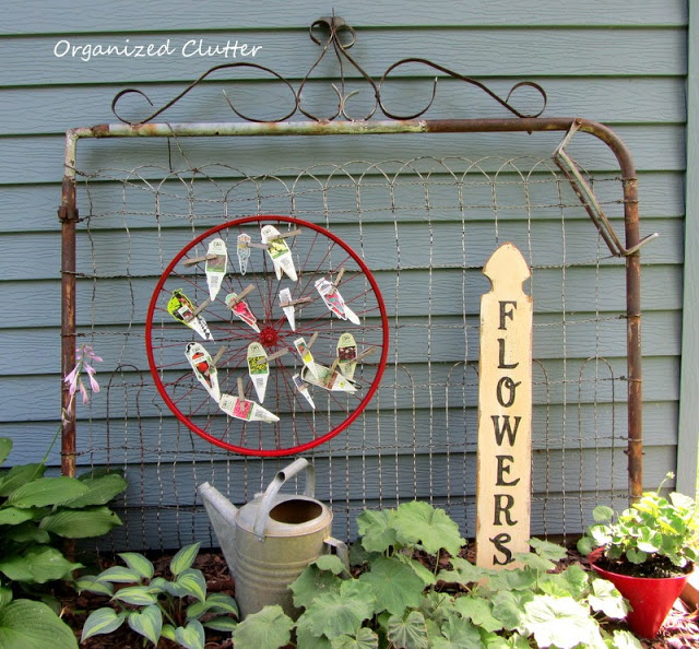 Garden markers on display in this creative garden kellyelko.com