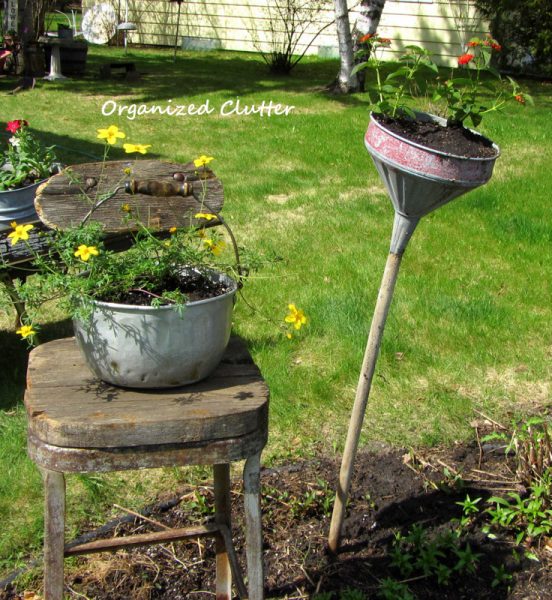 Junk planters in this garden tour kellyelko.com