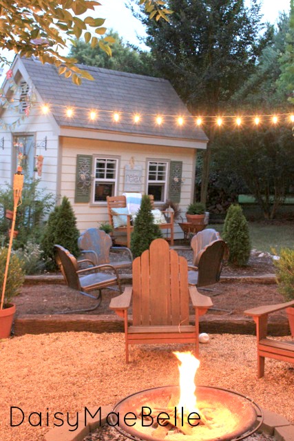 Love this fire pit and the shed turned craft room! kellyelko.com