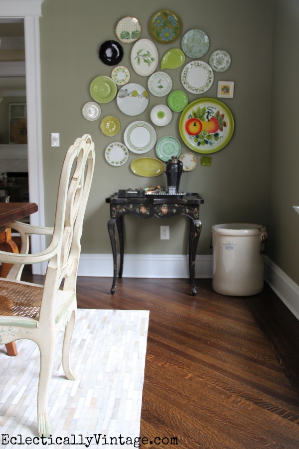 LOVE this eclectic plate wall - this dining room is stunning! kellyelko.com