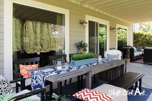 Outdoor lounge area - this patio is so inviting with all of the fun fabrics kellyelko.com