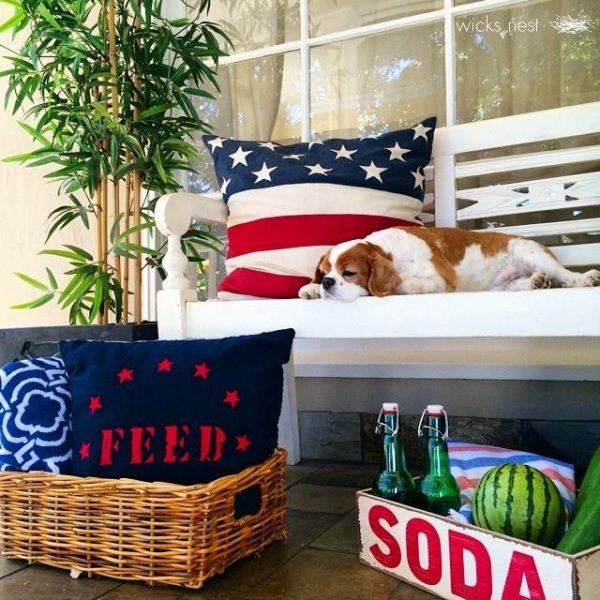 Patriotic red, white and blue porch - love the flag pillow kellyelko.com