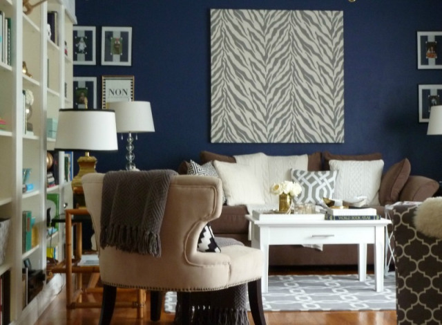 Cozy living room - love the rich blue wall color kellyelko.com