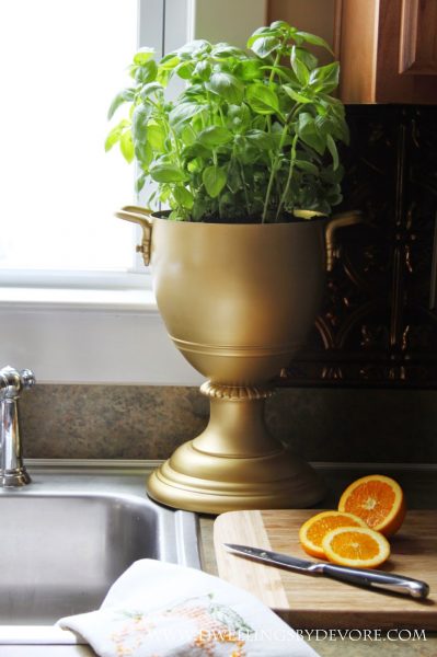 An old lamp becomes this fun trophy planter kellyelko.com