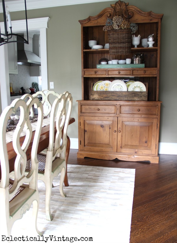 Love this dining room hutch filled with beautiful collections kellyelko.com #EclecticallyFall