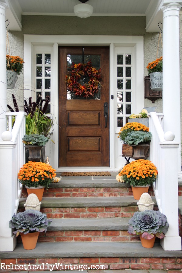 I love this welcoming fall porch - such great details. kellyelko.com