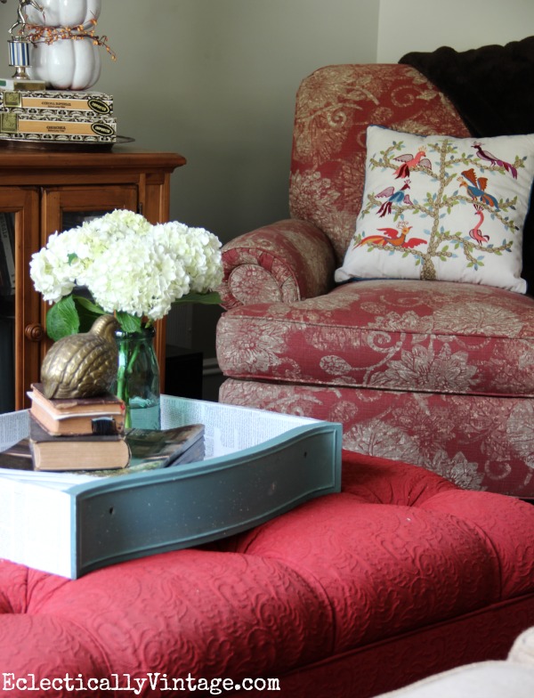 Cozy family room - love the tray and fun bird pillow! kellyelko.com #EclecticallyFall