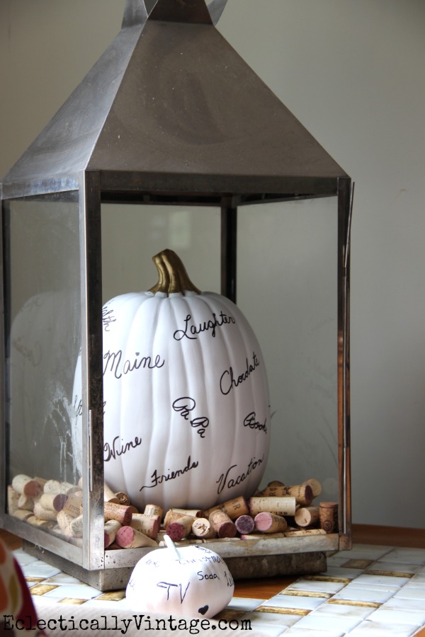 Thankful pumpkin in a lantern - love the corks too! kellyelko.com #EclecticallyFall