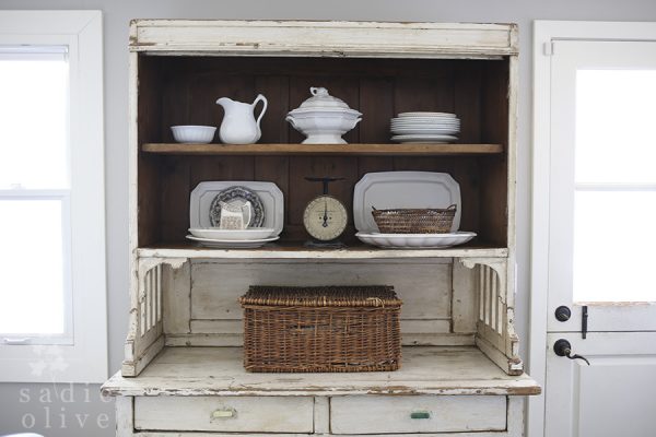 Beautiful chippy white cabinet is perfect for displaying an ironstone collection kellyelko.com