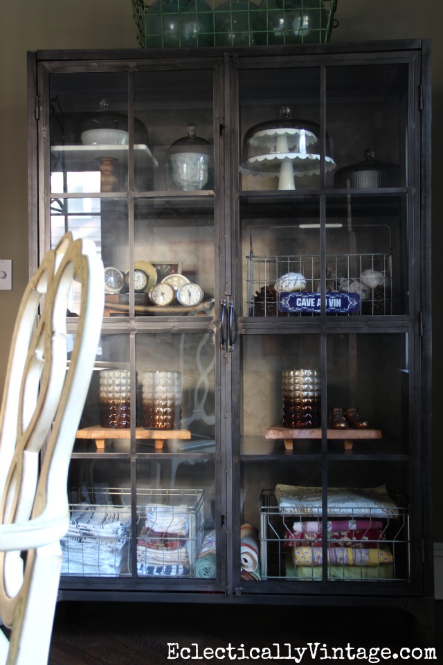 Love the glass doors of this industrial cabinet - perfect for displaying favorites kellyelko.com