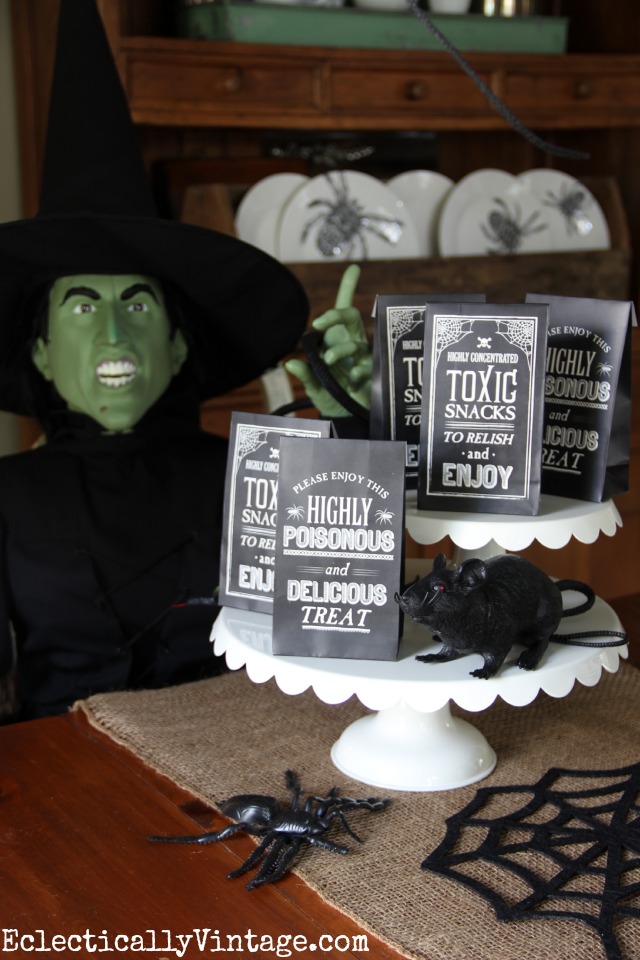 Easy Halloween Party Decorations - love the life-size Wicked Witch of the West! kellyelko.com