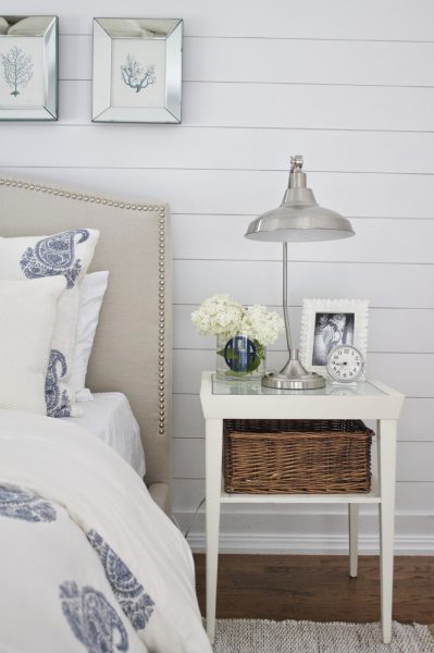 Beautiful bedroom with planked walls and blue nautical accents kellyelko.com