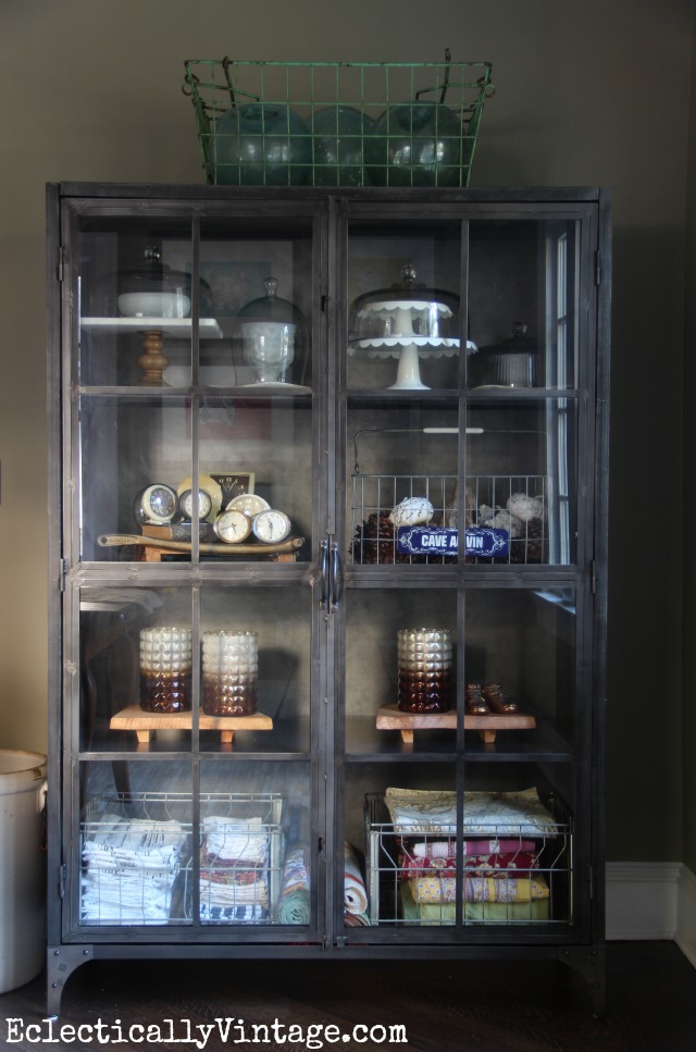 I love this huge industrial cabinet - perfect for displaying collections kellyelko.com