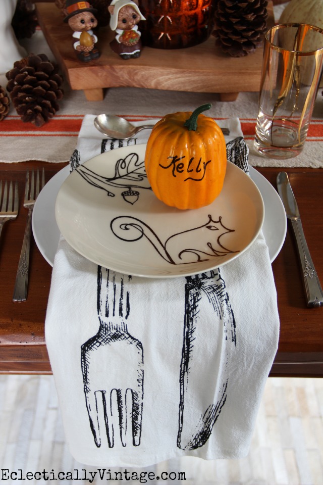 Thanksgiving Table Ideas - love everything about this from the pumpkin place settings to the squirrel plates to those fabulous napkins! kellyelko.com